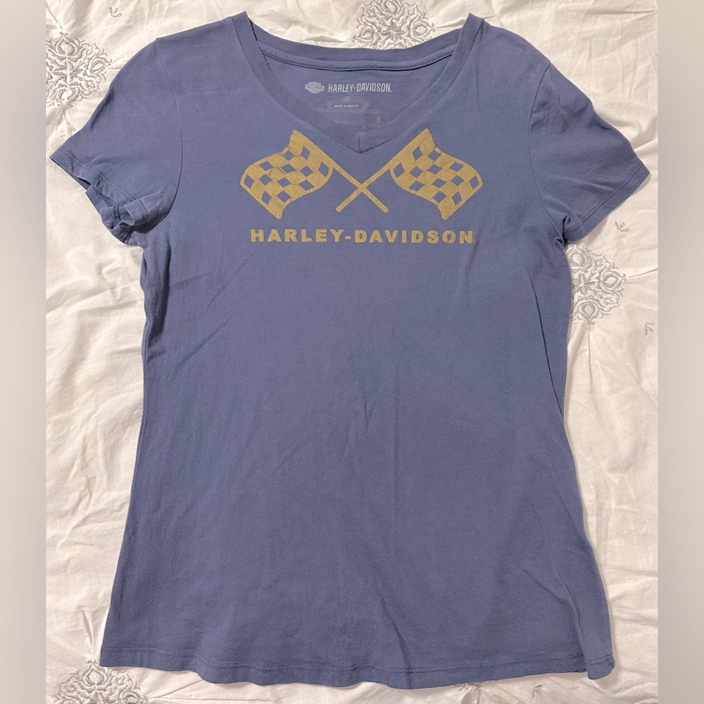 Harley Davidson women’s size Medium t-shirt. Blue with gold lettering